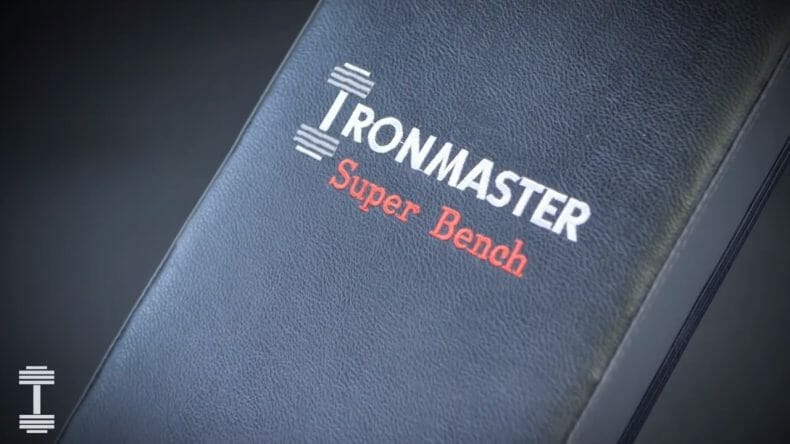 company logo on weight bench iron master