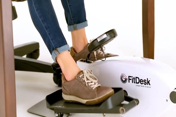 fit desk elliptical machine placed under a desk