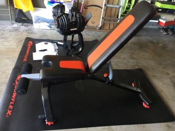 bowflex 5.1s stowage bench in garage gym