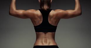 fit woman with strong shoulder muscles