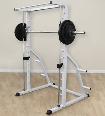 Deltech fitness smith machine Deltech Fitness smith machine loaded with weight plates