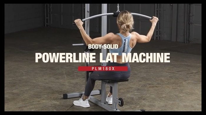 powerline lat pulldown machine woman performing lat pulldown on powerline lat pulldown machine