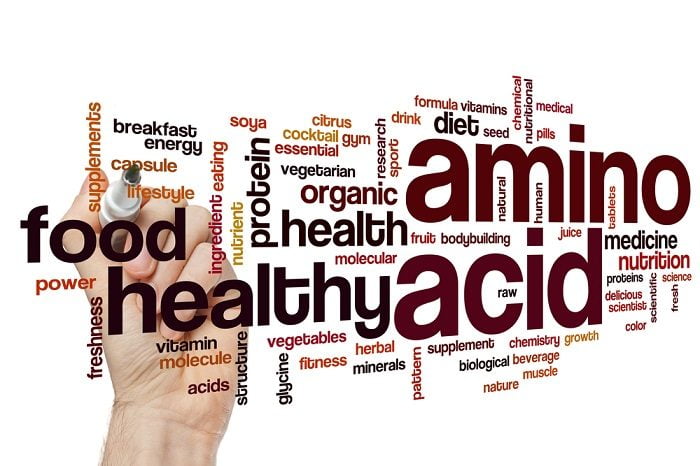 essential amino acids amino acids written on a white board