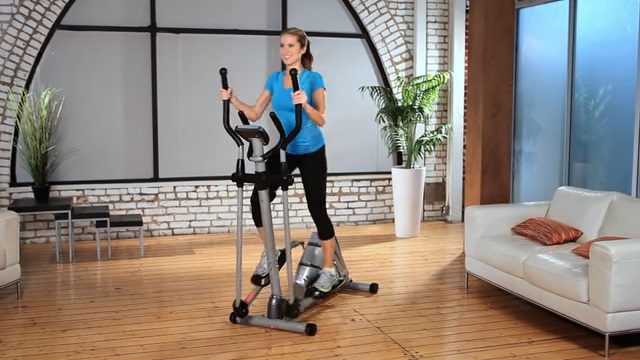 woman exercising on exerpeutic 1000xl elliptical machine