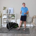 man explaining functions of body rider fan elliptical trainer