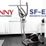 full view of sunny health and fitness SF-E905 elliptical bike in front room of house