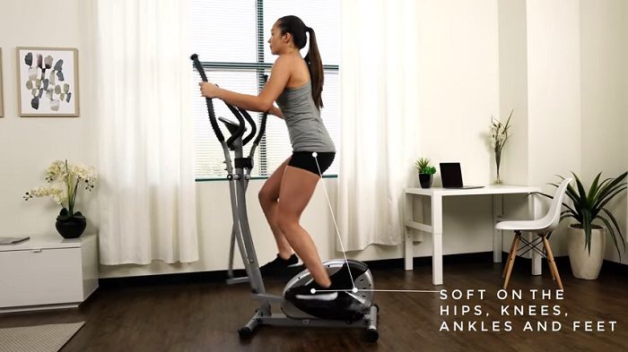 sunny sf-e905 elliptical machine woman exercising on sunny SF-E905 elliptical trainer
