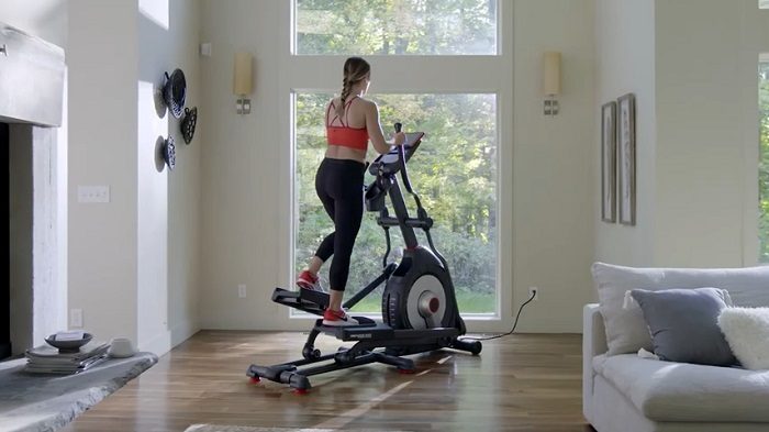 demonstration of schwinn 470 elliptical trainer in home