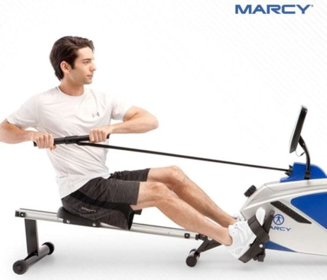 Marcy foldable rower man rowing on marcy rowing machine