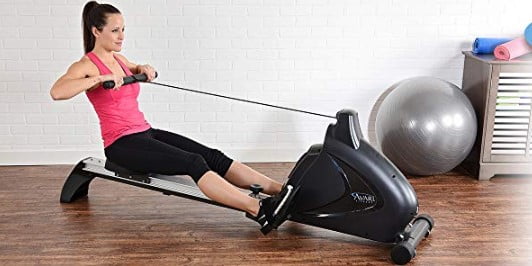Stamina-avari-magnetic-rowing-machine woman rowing on Stamina-avari-magnetic-rowing-machine in her home gym