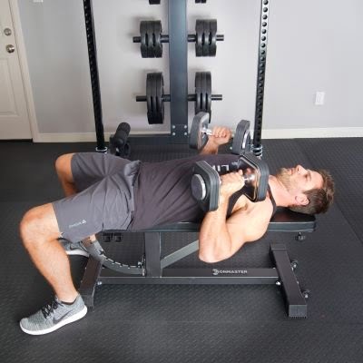 ironmaster in flat mad dumbbell pressing on ironmaster pro