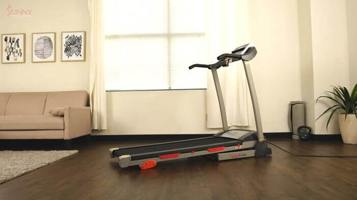 Sunny Health & Fitness SF-T4400 Treadmill with Manual Incline sunny health sf-t4400 treadmill in front room of house