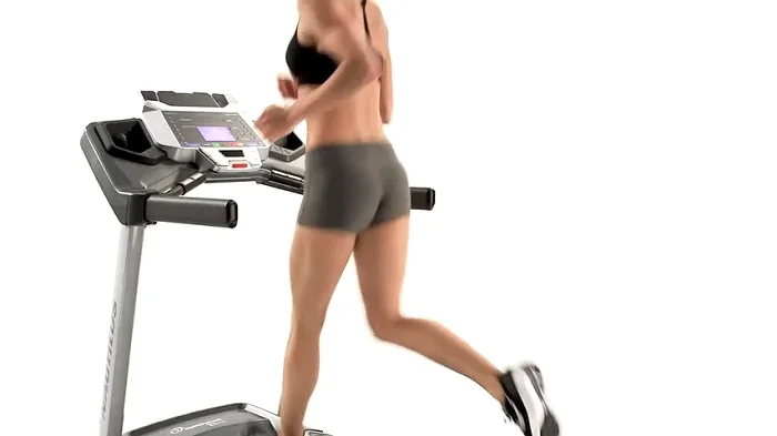 woman running on nautilus T614 treadmill