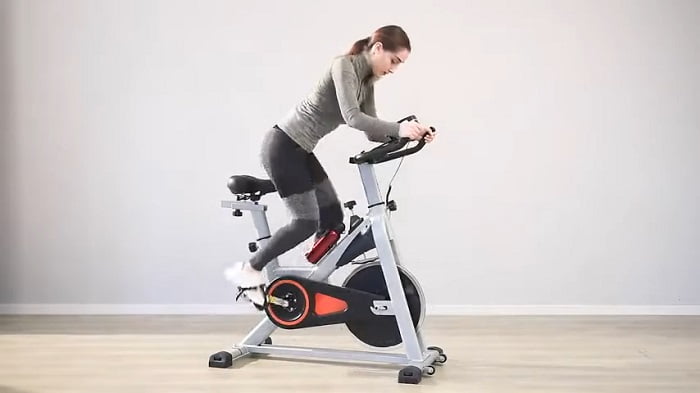 woman cylcling on Merax spin bike