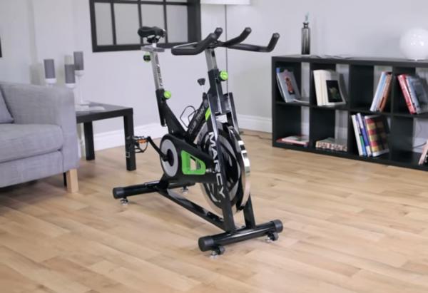 The Marcy Club Trainer XJ-3220 Marcy Revolution Cycle in front room of house