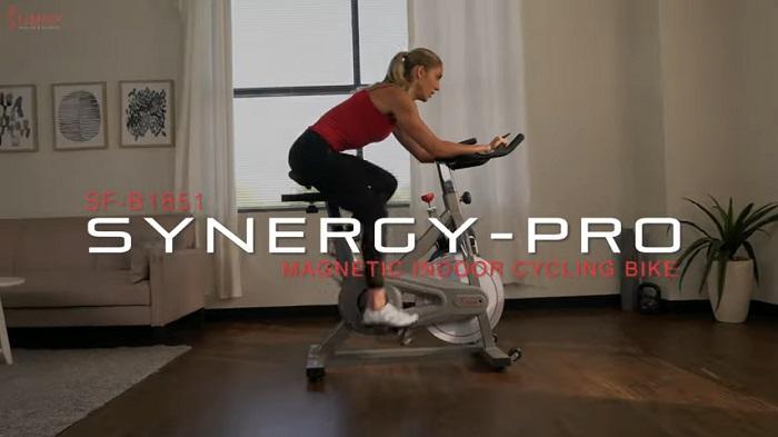 Synergy Pro Magnetic Indoor Cycling Bike SF-B1851 Sunny Health Synergy Pro Magnetic Indoor Cycling Bike SF-B1851 in front room of house