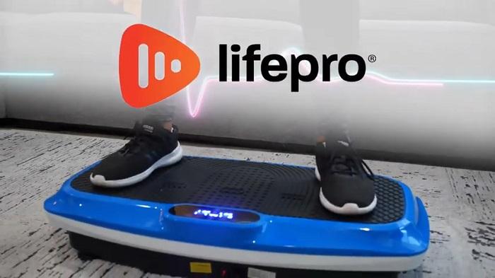 woman standing on Lifepro Turbo 3D Vibration Plate