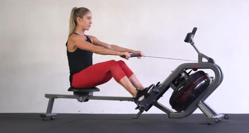 how to buy rowing machine woman rowing attractive woman rowing on a water rower