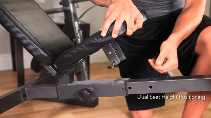 Marcy Diamond Elite Olympic Bench adjustable seat man adjusting seat of Marcy MD-857 bench