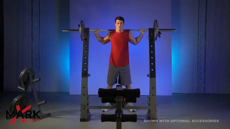 man performing squats using squat rack of xamrk olympic bench