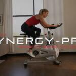 woman riding sunny synergy pro sf-b1851 in her home