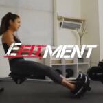 woman rowing on efitment rowing machine with fan