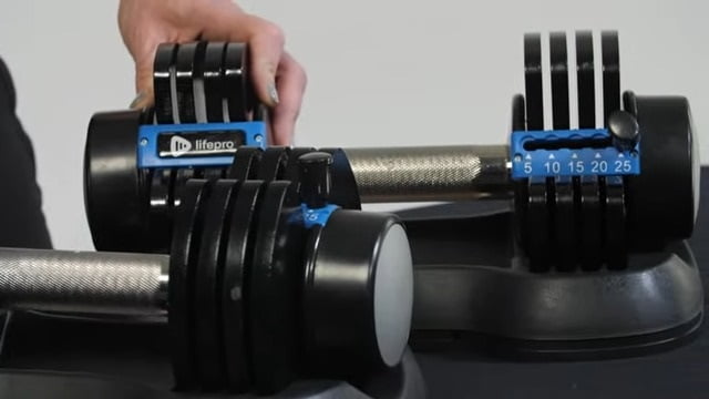 close up of lifepro dumbbells lifepro dumbbell adjustment system