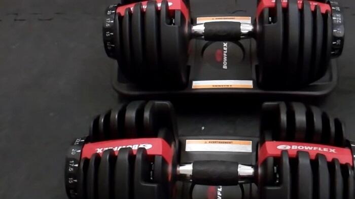 pair of bowflex 552 dumbbells 52.5lb per dumbbell