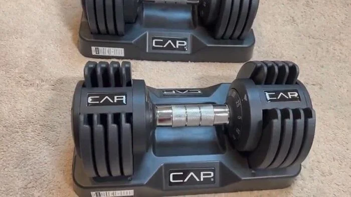 cap barbell 25lb adjustable dumbbells cap adjustable dumbbells in their storage trays