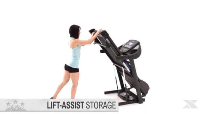 woman folding xterra fitnesss treadmill