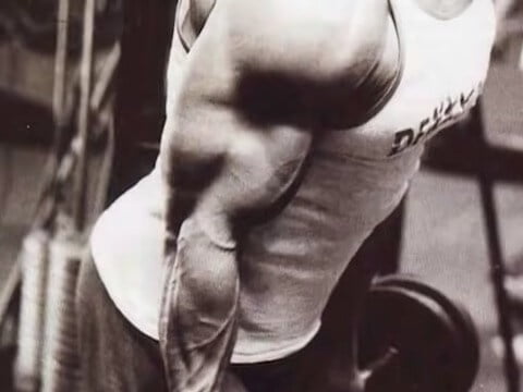 arnie barbell curls barbell curls black and white picture