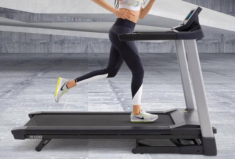 woman running on lifespan tr1200i treadmill