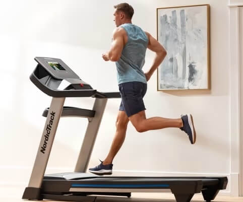 man running on nordictrack exp 10i treadmill