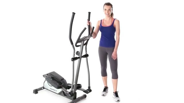 marcy ellitpical trainer woman standing next to Marcy Elliptical Trainer