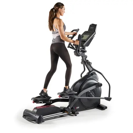 E55 elliptical trainer woman pedaling e55 elliptical machine