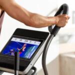 Man viewing ifit on NordicTrack commercial 14.9 elliptical