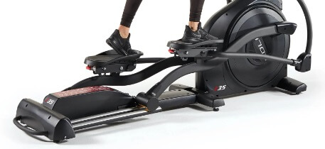 Sole Fitness E35 Elliptical stride length woman on Sole Fitness E35 Elliptical showing stride length