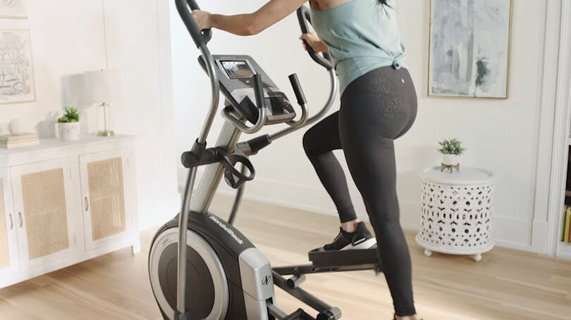 woman pedaling on 20" stride elliptical