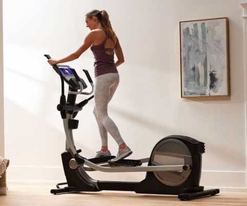 woman pedaling se71 elliptical woman pedaling se7i elliptical