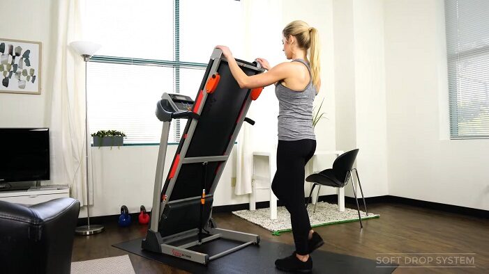 Sunny Health & Fitness SF-T4400 Treadmill folding woman folding treadmill deck of sunny treadmill