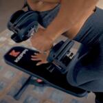 woman performing dumbbell rows on keppi 900lb weight bench