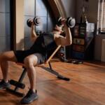man dumbbell pressing on lusper adjustable weight bench