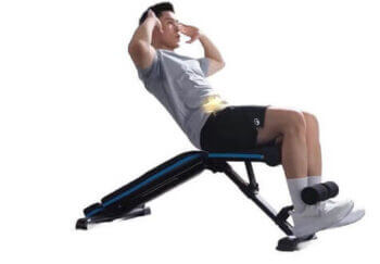 merach adjustable weight bench man performing sit ups on merach weight bench, white background