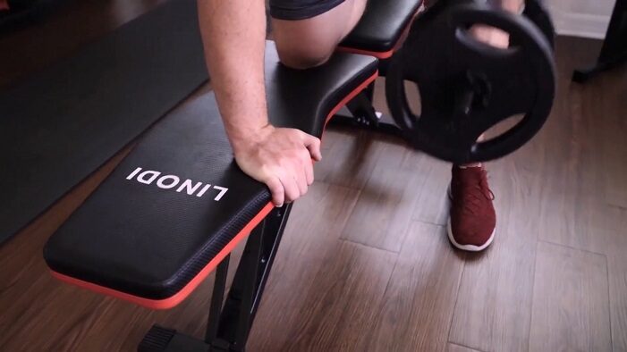 Linodi weight bench man performing dumbbell rows