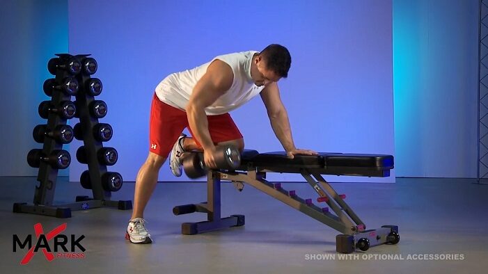 man performing dumbbell rows on xmark weight bench