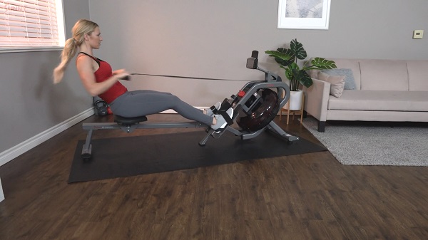 sunny phantom hydro water rower woman rowing on sunny phantom hydro water rowing machine